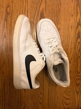 Nike White Low-Top Sneakers with Black Swoosh Accent